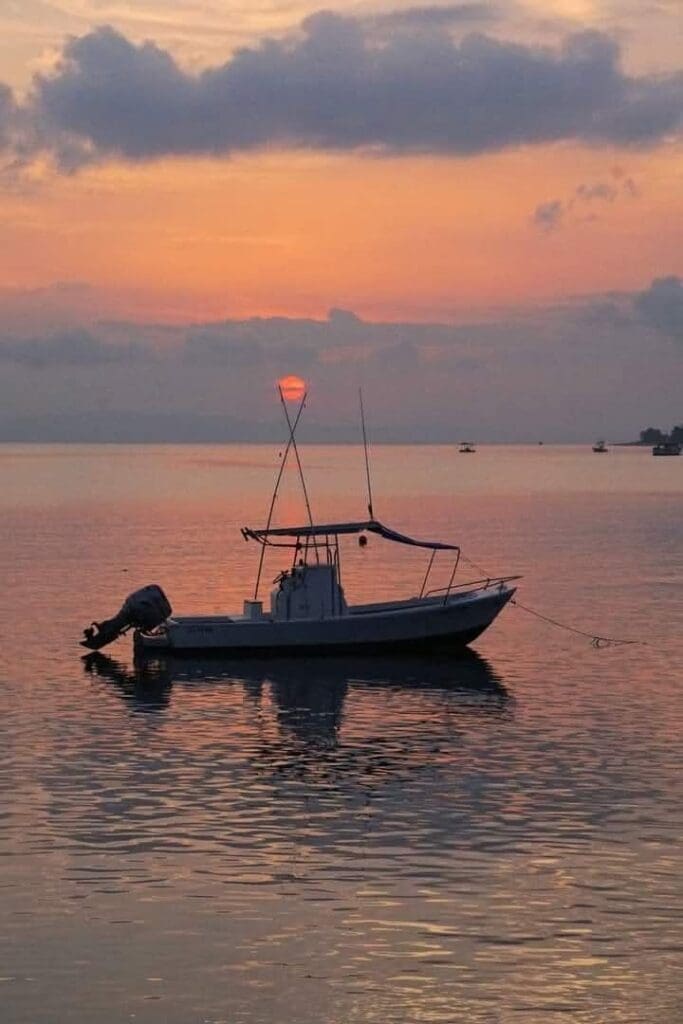 sunrise over fishing boat osa peninsula